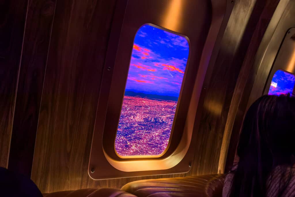 Looking out the window at "Mexico City" in a booth at Carry On