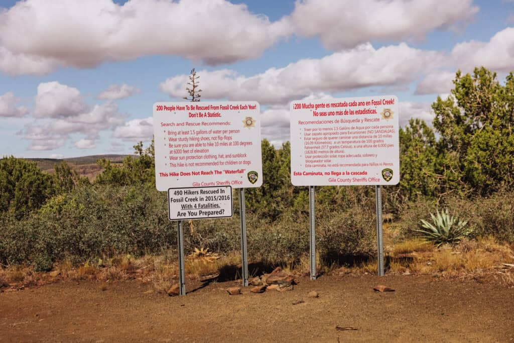 Warning signs on the trail to Fossil Springs