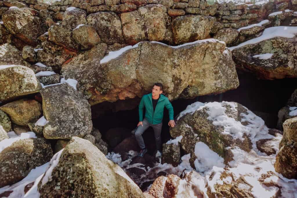 The Lava River Cave in fall or winter, with snow on the ground