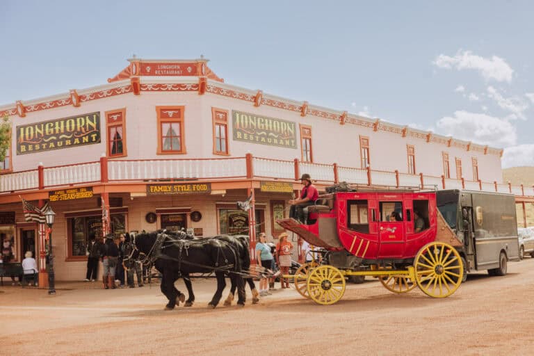 A Wells Fargo Stagecoach and horses on Allen Street in Tombstone, AZ