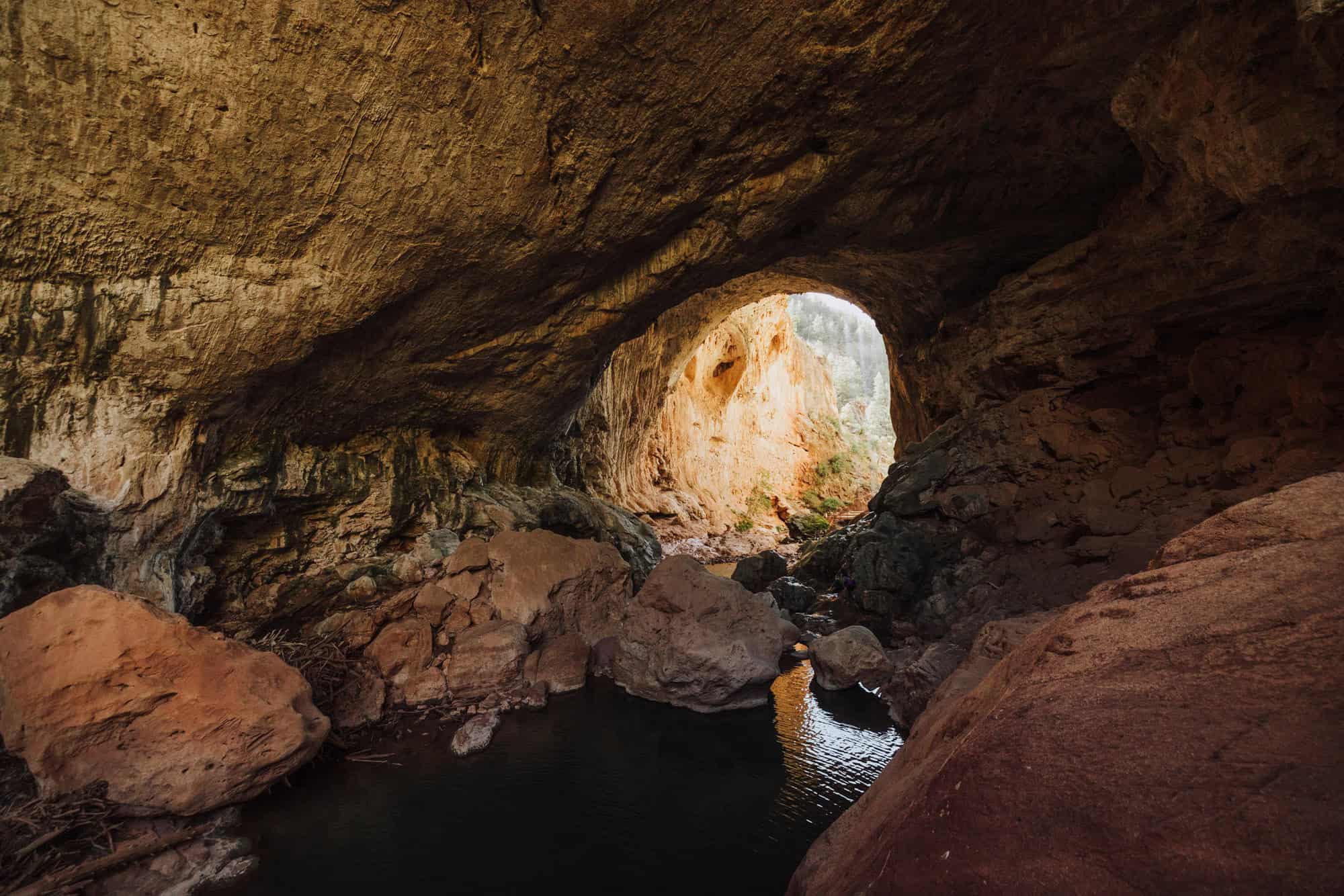 Looking through the tunnel at Tonto Natural Bridge State Park in Arizona