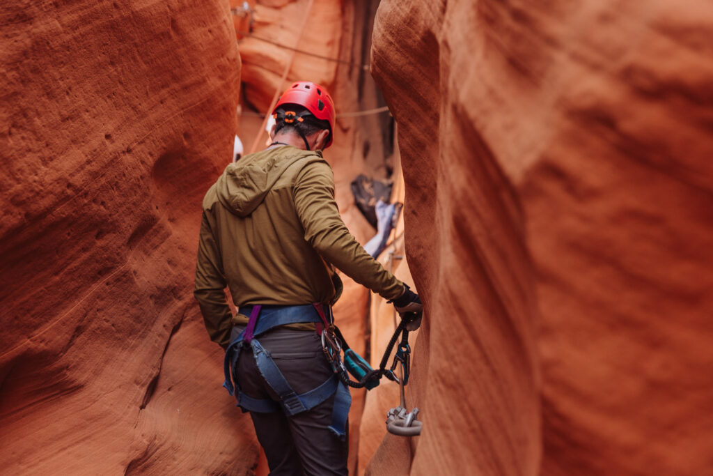 Crossing through the canyon on the via ferrata rungs