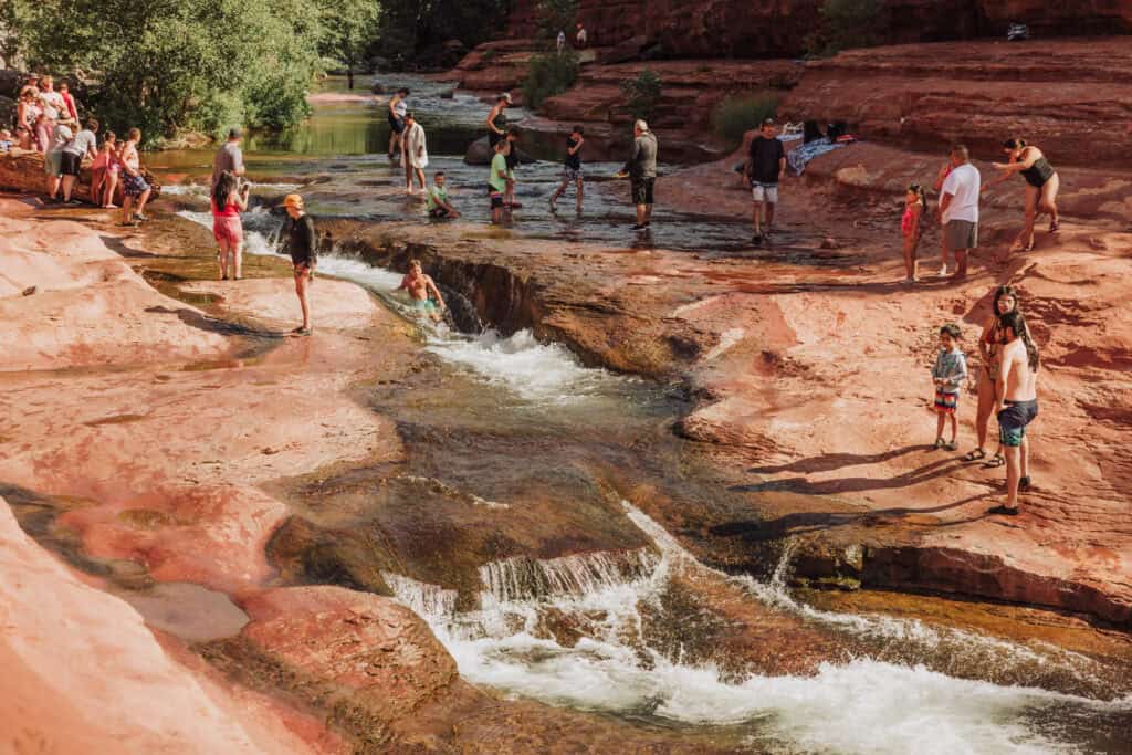 People swimming at Slide Rock State Park in Sedona